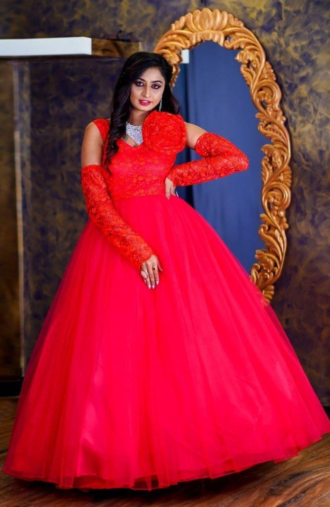 red gown with hand glaves